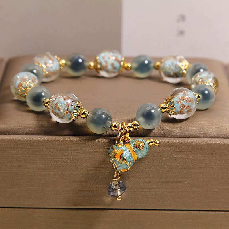 FREE Today: Strength and Harmony Blue Candy Agate Liuli Glass Gourd Charm Bracelet - image 8