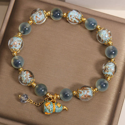 FREE Today: Strength and Harmony Blue Candy Agate Liuli Glass Gourd Charm Bracelet - image 3