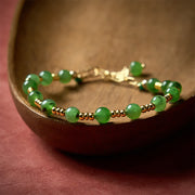 Bracelet de prospérité en perles de jade cyan naturel Foviel