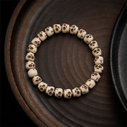 Bracelet Foviel en perles d'os tibétain motif crâne Seigneur de la Forêt des Cadavres pour la protection et le courage
