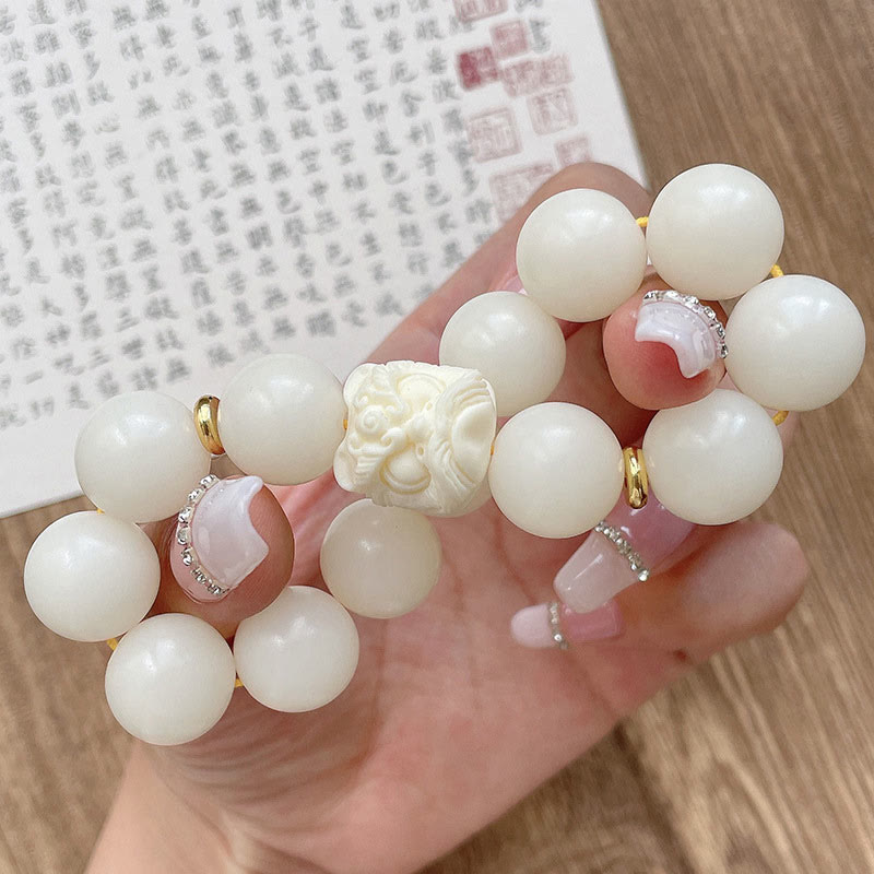 Buddha Stones Silver Sheen Obsidian Bodhi Seed Ivory Fruit Dancing Lion Protection Bracelet