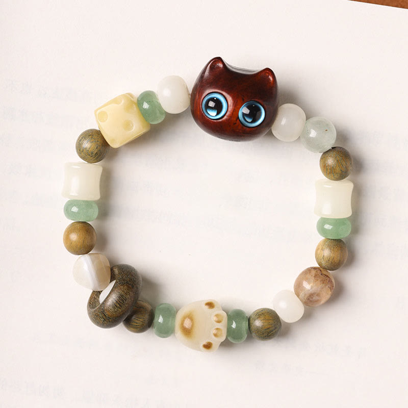 Bracelet de paix Foviel avec tête et patte de chat en graine de Bodhi, bois de santal vert, bois d'ébène et bois de santal rouge à petites feuilles