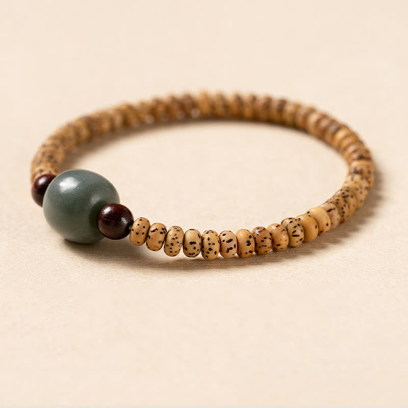 Bracelet de sagesse Foviel en bois de santal rouge à petites feuilles et graines de Bodhi