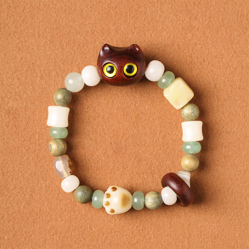 Bracelet de paix Foviel avec tête et patte de chat en graine de Bodhi, bois de santal vert, bois d'ébène et bois de santal rouge à petites feuilles