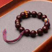 Bracelet à pompon Foviel en perles de graines de Bodhi, symbole de paix et de calme