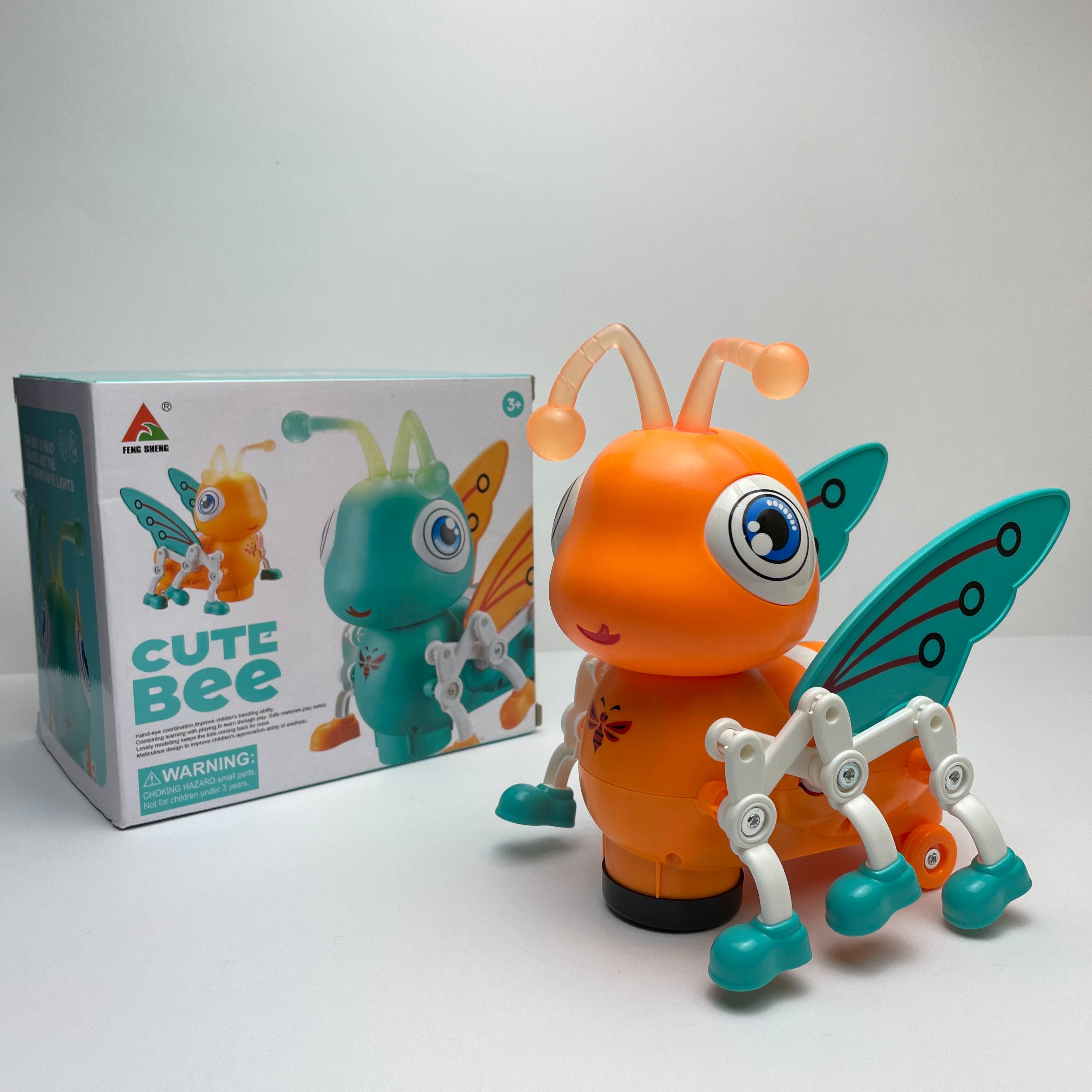 Jouet musical Fidtoy en forme d'abeille avec lumières et rotation à 360°