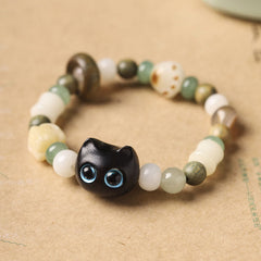 Bracelet de paix Foviel avec tête et patte de chat en graine de Bodhi, bois de santal vert, bois d'ébène et bois de santal rouge à petites feuilles