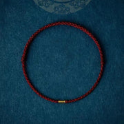 Bracelet ou chevillère Foviel en argent sterling 925 avec perle dorée porte-bonheur sur cordon tressé