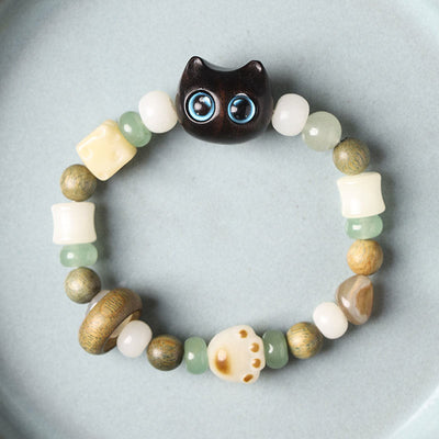 Bracelet de paix Foviel avec tête et patte de chat en graine de Bodhi, bois de santal vert, bois d'ébène et bois de santal rouge à petites feuilles