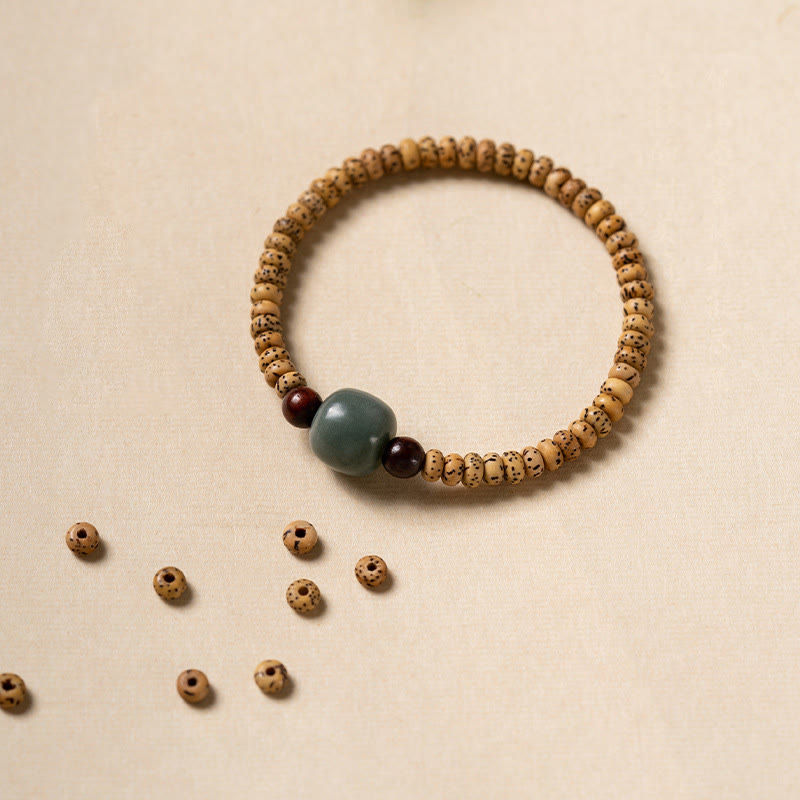 Bracelet de sagesse Foviel en bois de santal rouge à petites feuilles et graines de Bodhi