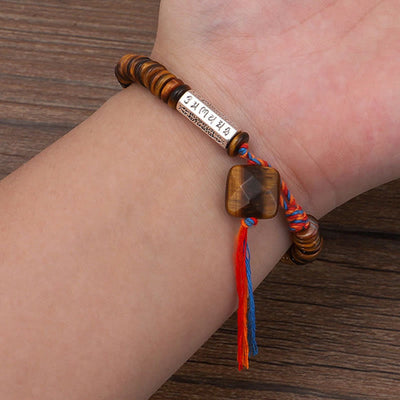 Bracelet de protection Foviel en œil de tigre tibétain avec mantra Om Mani Padmé Hum