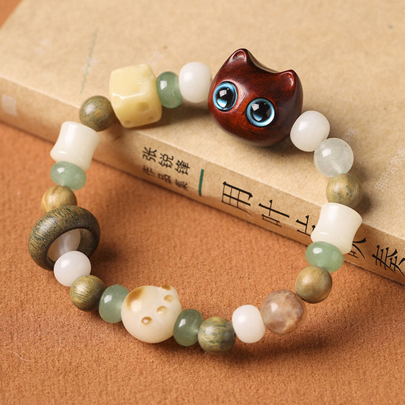 Bracelet de paix Foviel avec tête et patte de chat en graine de Bodhi, bois de santal vert, bois d'ébène et bois de santal rouge à petites feuilles