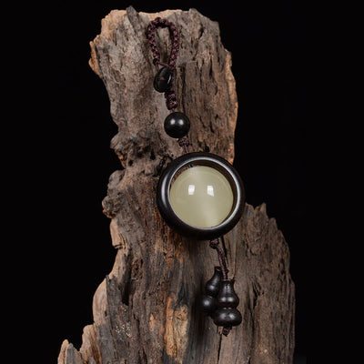 Porte-clés gourde porte-bonheur lumineux en bois de santal rouge, bois d'ébène et bois de santal vert Foviel