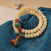 Bracelet double tour Foviel à breloque de lotus et graine de Bodhi pour la paix