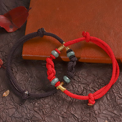 Bracelet couple tressé Foviel à nœud chinois en jade et fil rouge porte-bonheur
