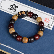 Bracelet de la paix Foviel en bois de santal vert, ébène et bois de santal rouge multicolores