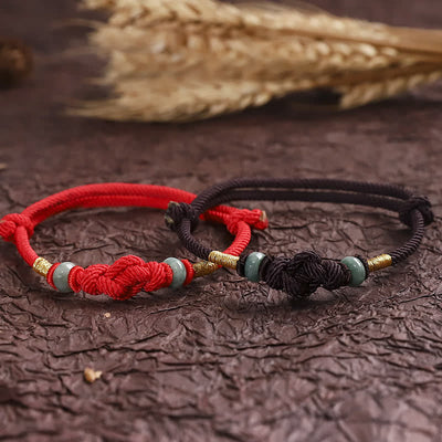 Bracelet couple tressé Foviel à nœud chinois en jade et fil rouge porte-bonheur