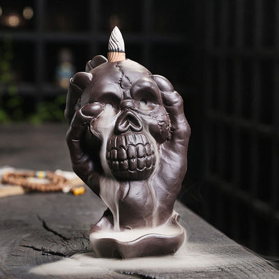 Buddha Stones Halloween Skull With Ghost Hand Purple Clay Spiritual Incense Burner Decoration Incense Burner BS Halloween Skull With Ghost Hand 9.6*11.2*15.5cm
