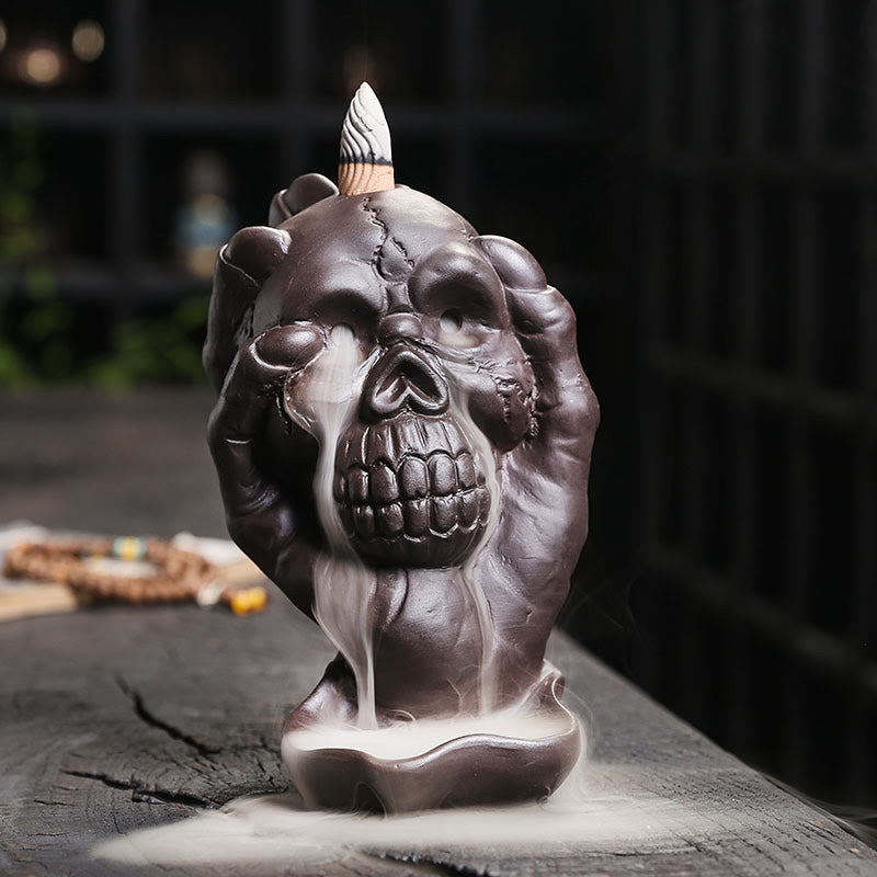 Buddha Stones Halloween Skull With Ghost Hand Purple Clay Spiritual Incense Burner Decoration Incense Burner BS Halloween Skull With Ghost Hand 9.6*11.2*15.5cm