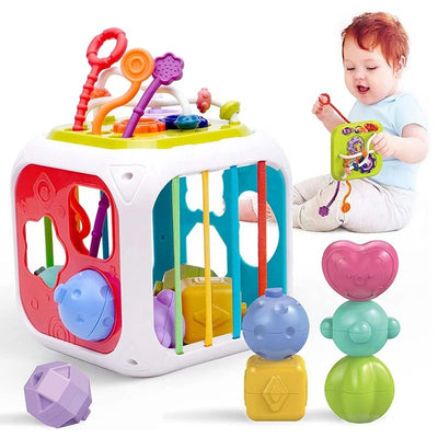 Fidtoy 7-in-1 Montessori Activity Cube for Toddlers – Multifunctional Sensory Learning Cube with Shape Sorter, Xylophone, Gears, Beads, Pull String, and Stacking Blocks