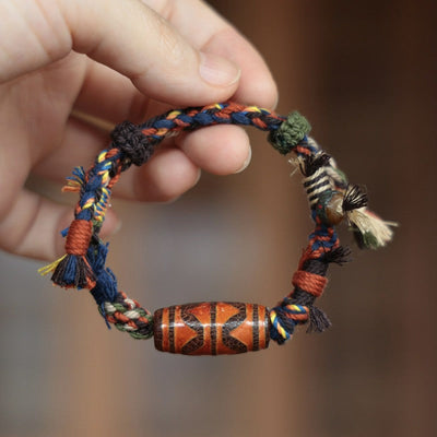 Buddha Stones Vintage Tibetan Dzi Bead Luck Rope Bracelet - Double-Tiger-Tooth Dzi Bead (Wrist Circumference: 5.9–7.1 in/15–18 cm) - image 0