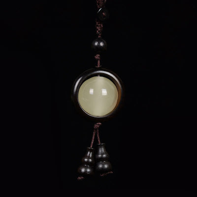 Porte-clés gourde porte-bonheur lumineux en bois de santal rouge, bois d'ébène et bois de santal vert Foviel