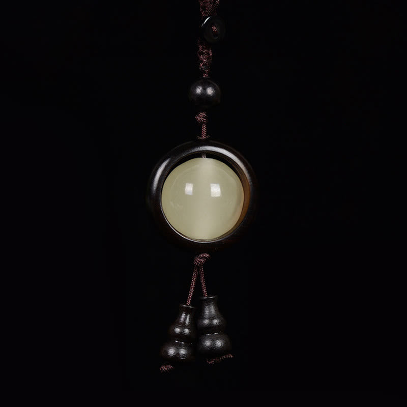 Porte-clés gourde porte-bonheur lumineux en bois de santal rouge, bois d'ébène et bois de santal vert Foviel