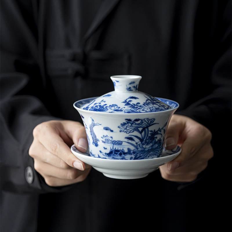 Buddha Stones Blue And White Porcelain Lotus Koi Fish Lion Dance Watermelon Ceramic Gaiwan Sancai Teacup Kung Fu Tea Cup And Saucer With Lid 300ml Cup BS Lotus Koi Fish 12.4cm*11cm*300ml