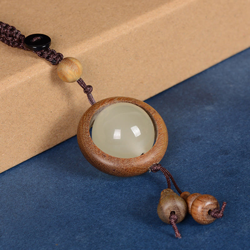 Porte-clés gourde porte-bonheur lumineux en bois de santal rouge, bois d'ébène et bois de santal vert Foviel