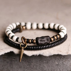 Bracelet de couple Foviel en perles d'os, bois d'ébène et cuivre, symbole de force