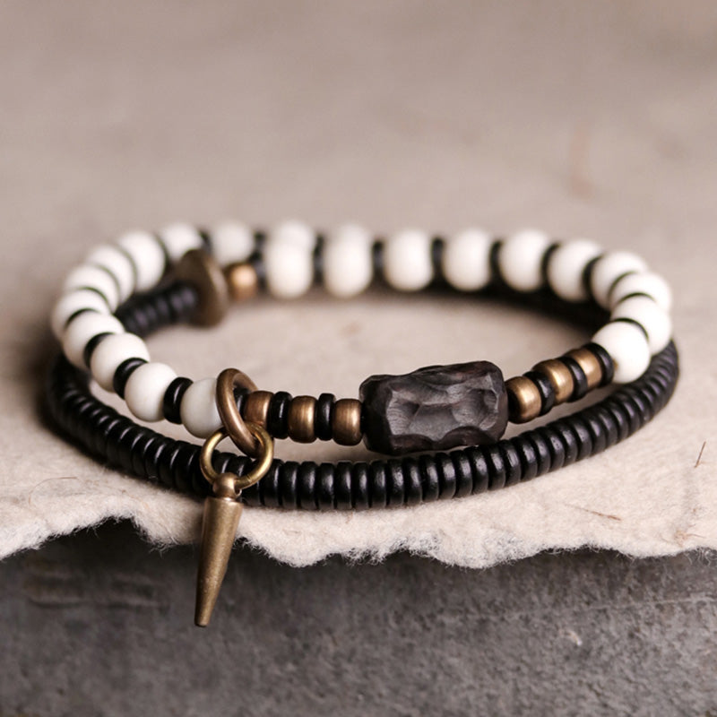 Bracelet de couple Foviel en perles d'os, bois d'ébène et cuivre, symbole de force