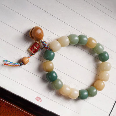 Buddha Stones Natural Gradient Bodhi Seed Wisdom Wooden Fish Drum Charm Bracelet Bracelet BS 2