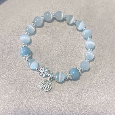 Buddha Stones Cat's Eye Crystal Peach Blossom Bell Fu Character Charm Support Bracelet 5