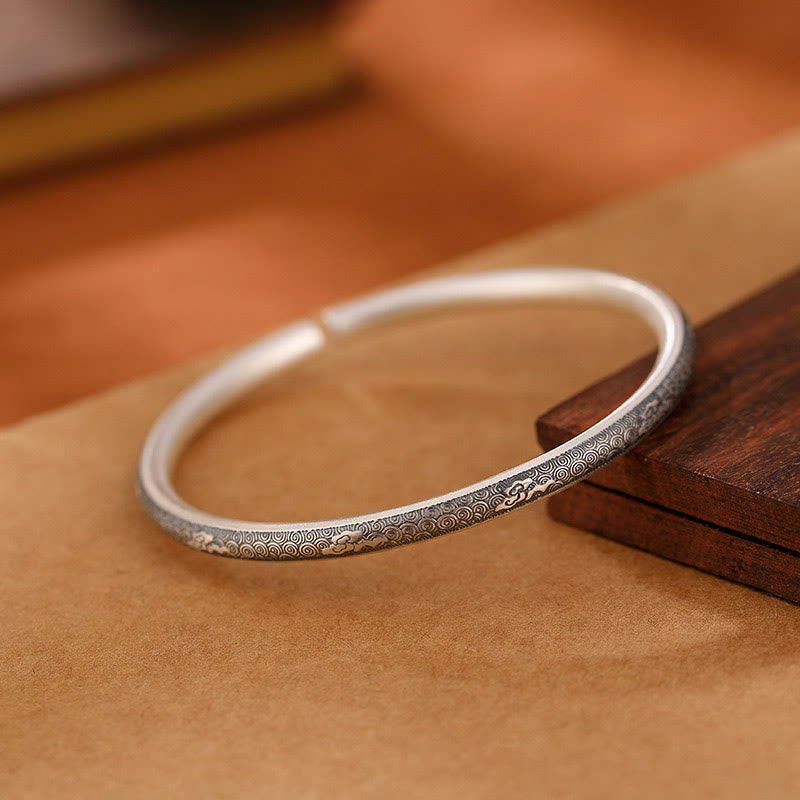 Bracelet jonc Foviel Vintage en argent sterling 999 motif nuages auspicieux