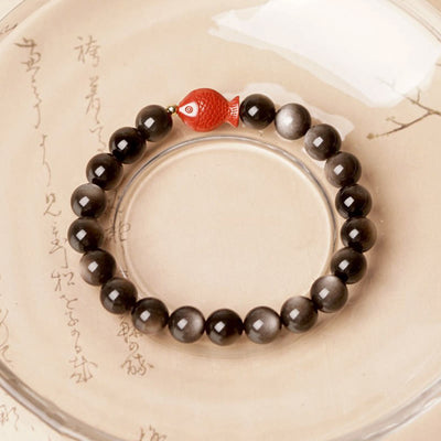 Bracelet Foviel en obsidienne argentée naturelle, cinabre et motif de poisson koï pour une protection apaisante