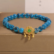 Bracelet de guérison Foviel avec breloque cadenas chinois en agate bleue candy